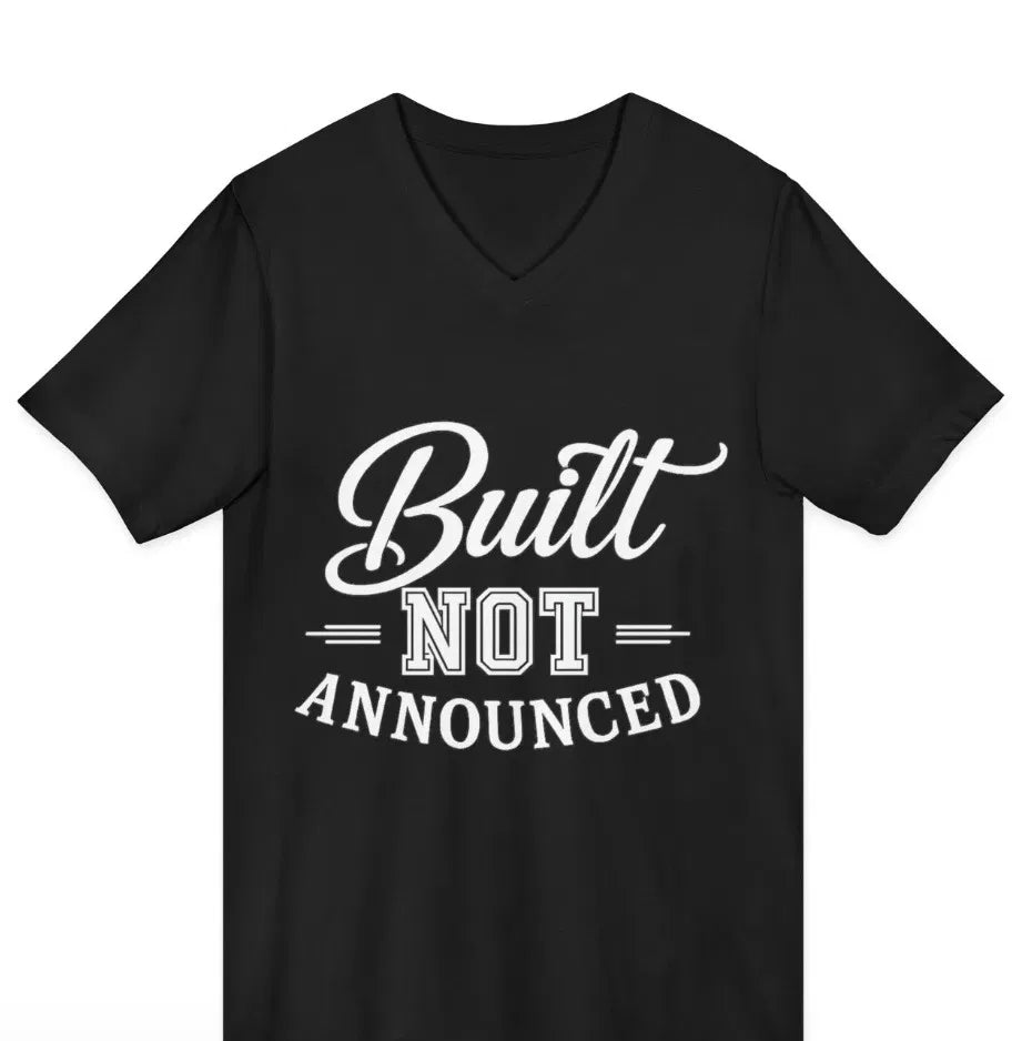 Built, Not Announced black graphic V-neck t-shirt, front view — LUMENORA Studio quiet luxury statement tee